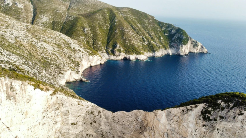 the ocean has very big rocky formations on it