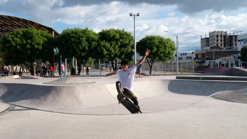 the skateboarder jumps off of the ramp to catch some air