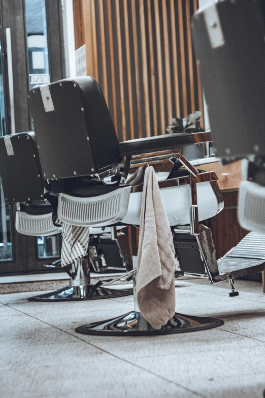 some chairs sitting on the floor near an area rug