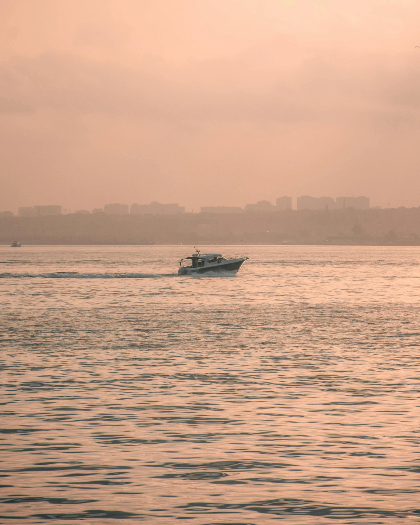 the boat is in the middle of the water