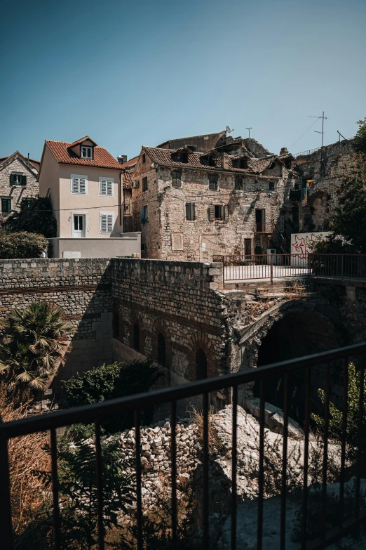 old buildings that are standing up against the sky