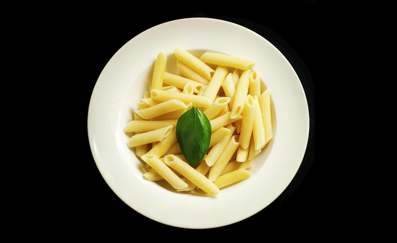 a plate with pasta on top is shown