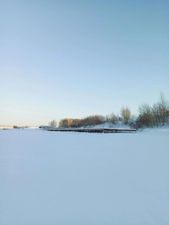 a snow covered field with no one on it