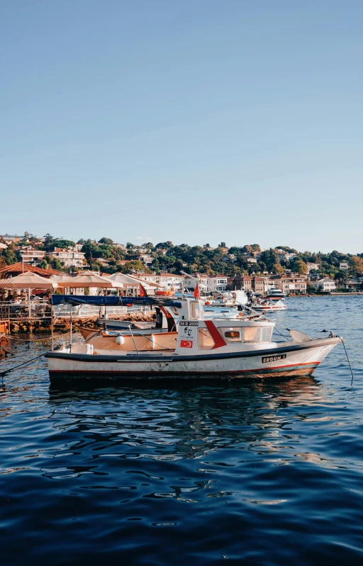 a boat on the water near a dock