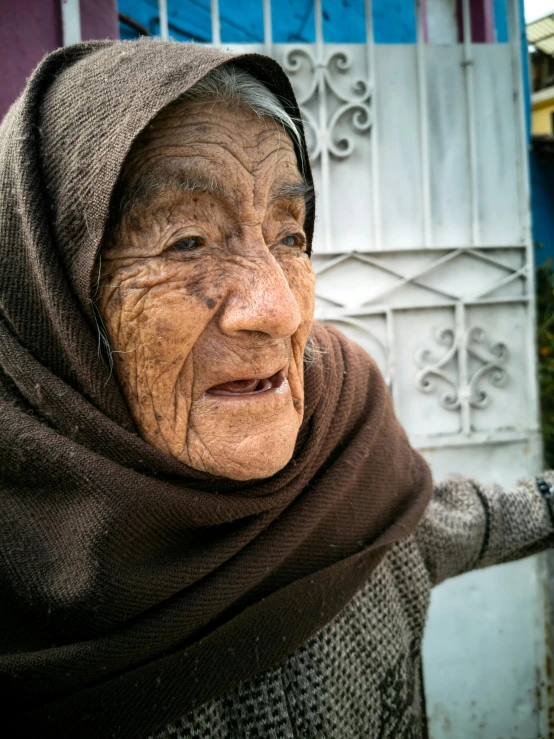 an older woman with wrinkles in her eyes