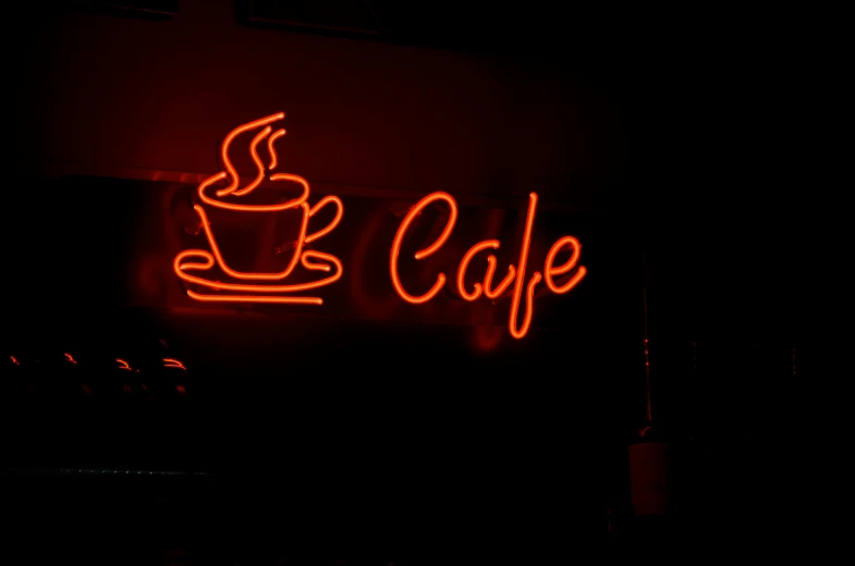 a neon sign that says coffee