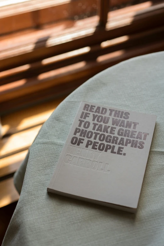 a white book sitting on top of a table