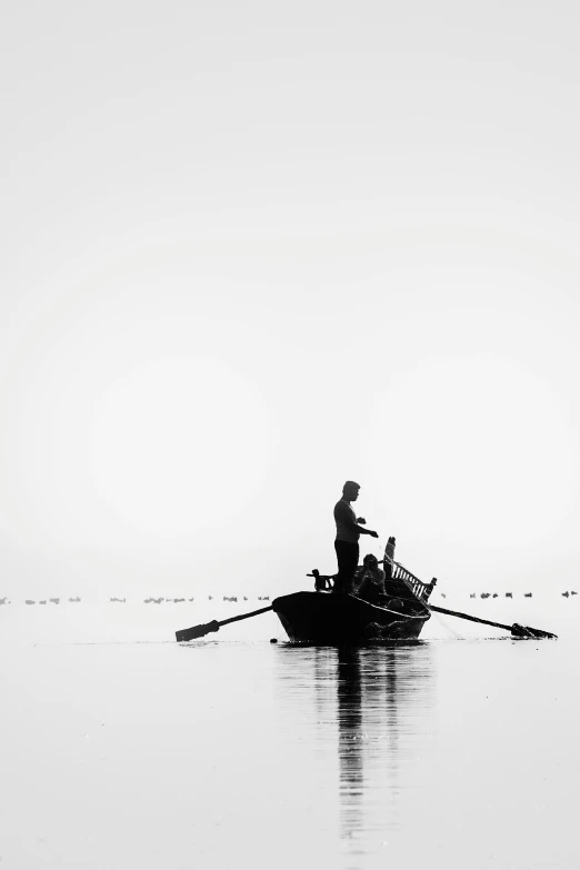 a man riding on the back of a boat