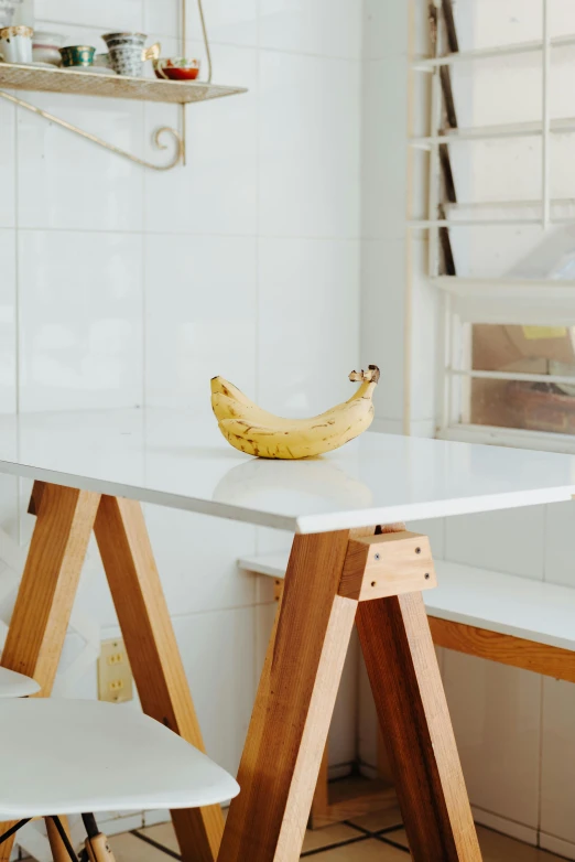 a banana that is sitting on a chair