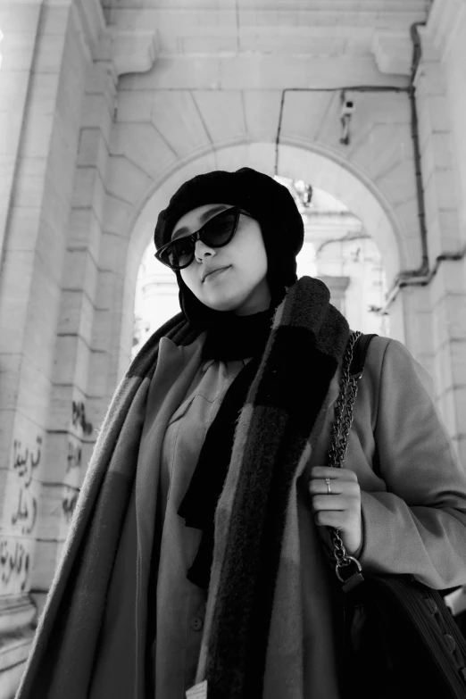 black and white pograph of a woman wearing sunglasses