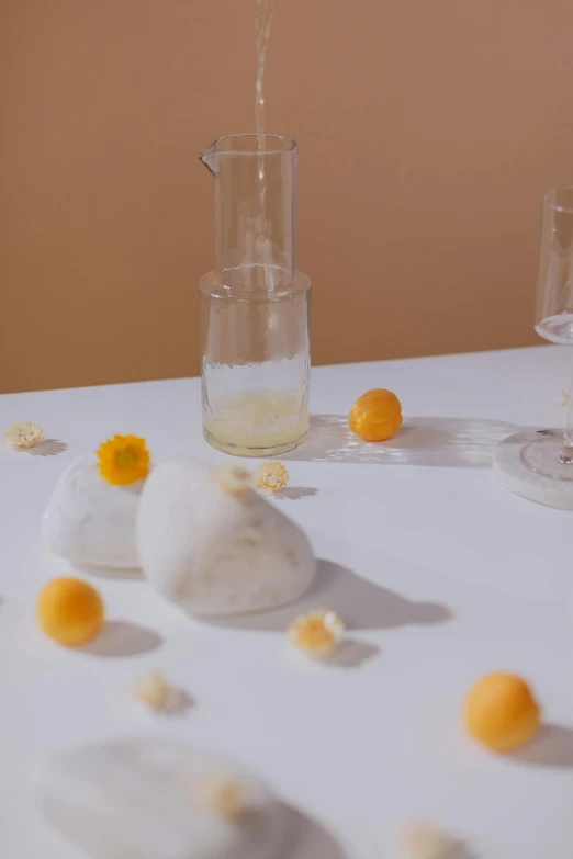 a small glass pitcher on top of a table