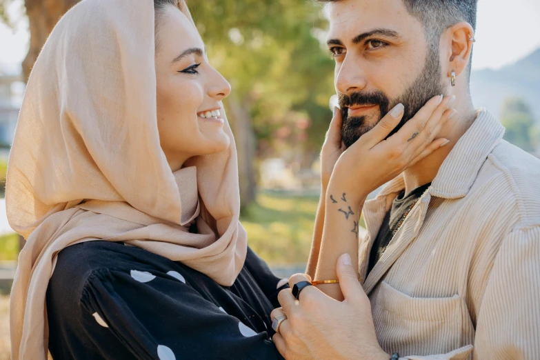 a man and a woman holding hands together