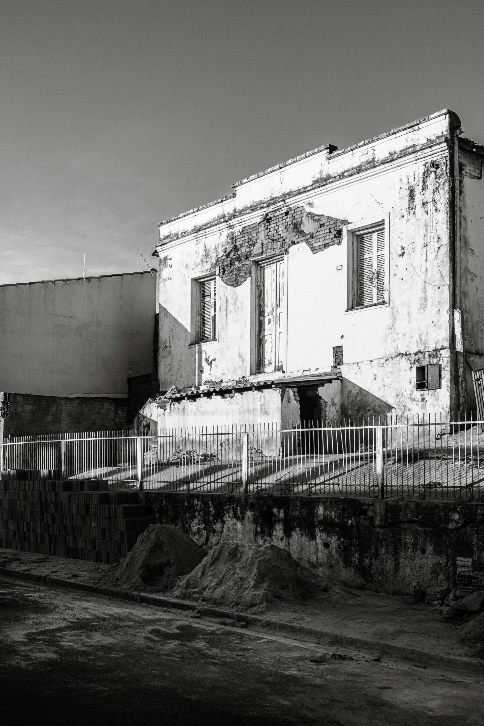 an old building with many windows on top of it