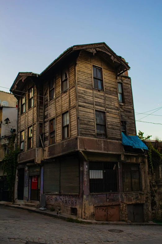 an old run down building in the center of town