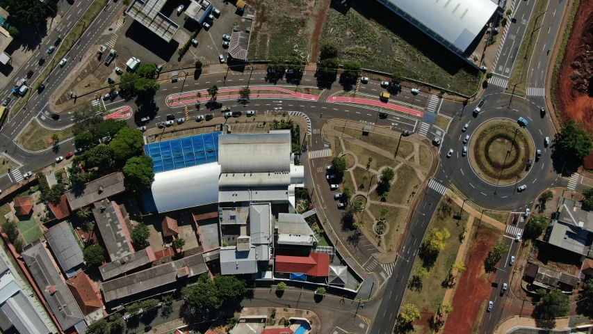 an aerial s of a street intersection with a blue roof