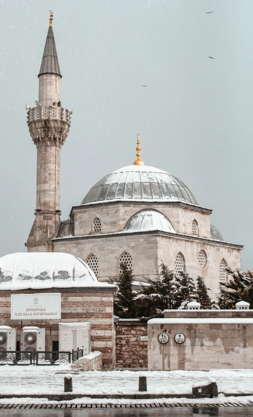 a large brick building with a domed dome and dome roof