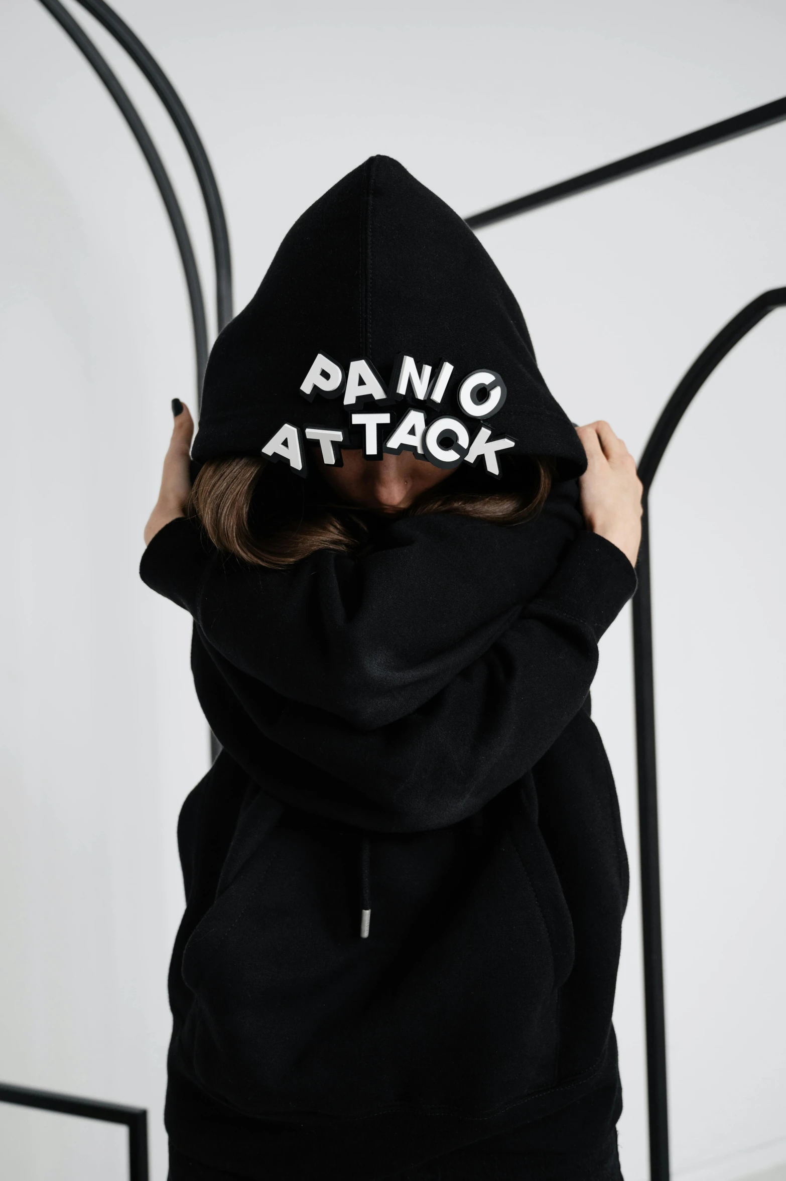 someone is wearing a hoodie with the word panic attack