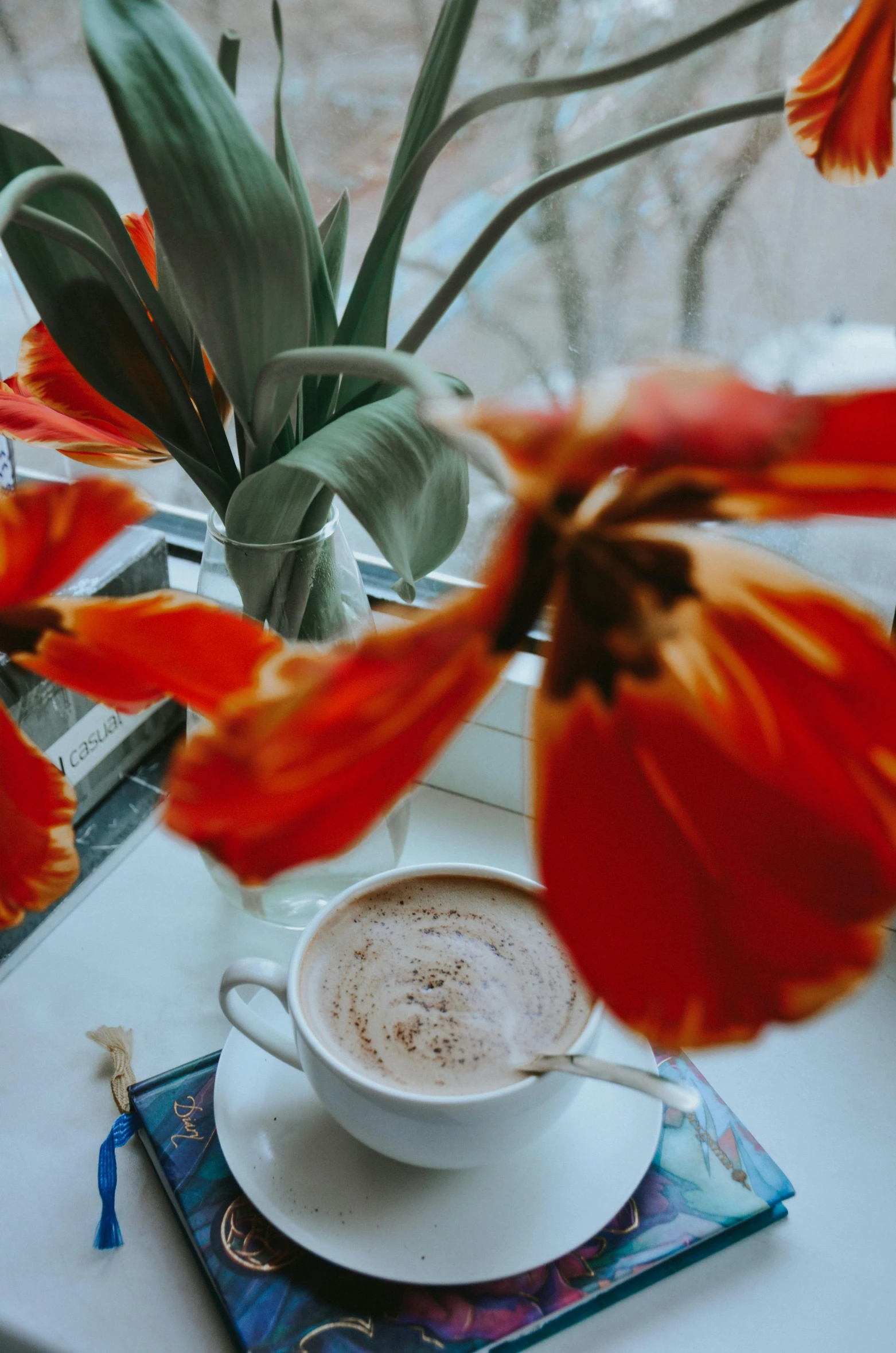 an image of a cup of coffee with flowers