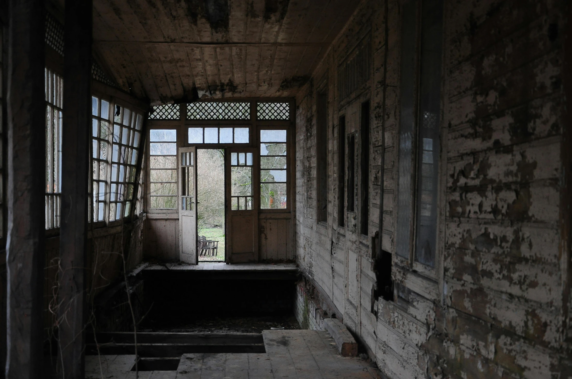 a run down building that has some windows on the inside