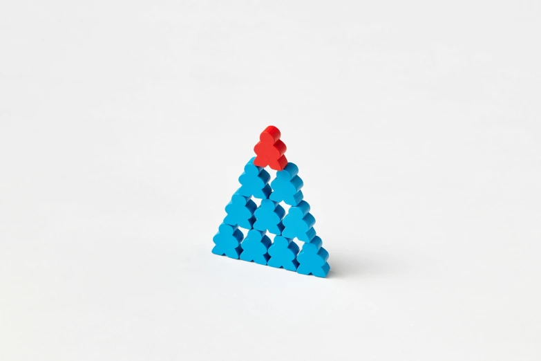 a toy made of a toy pyramid with a red and blue star