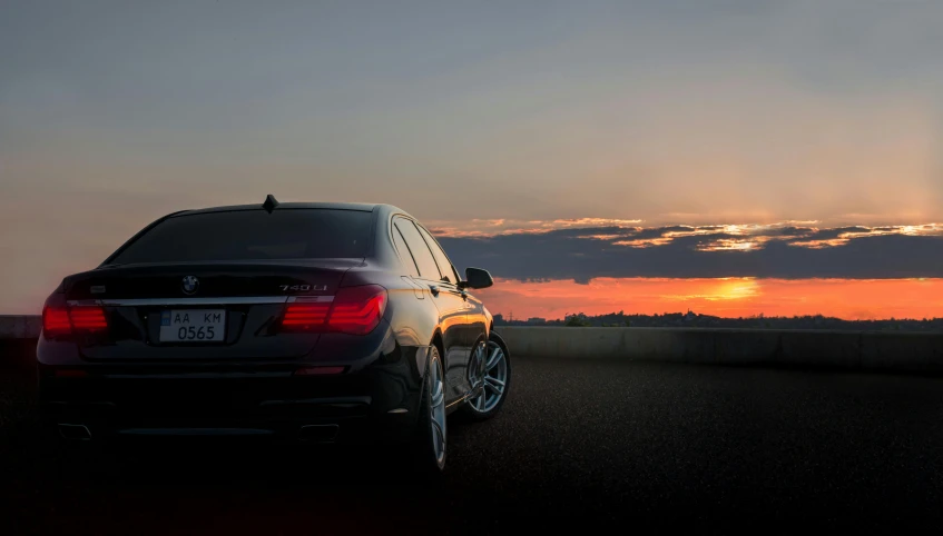 the back end of a car sitting in the road