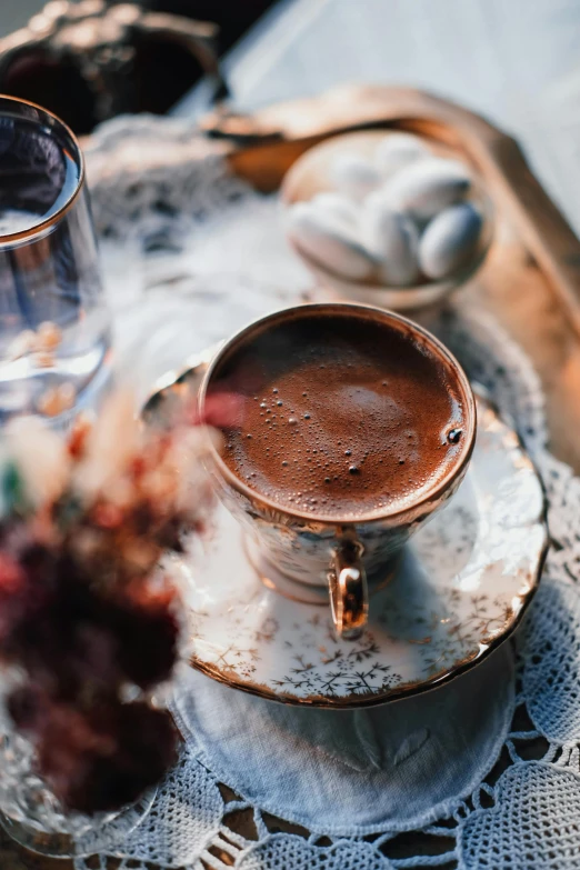 there is a very pretty brown beverage on a tray