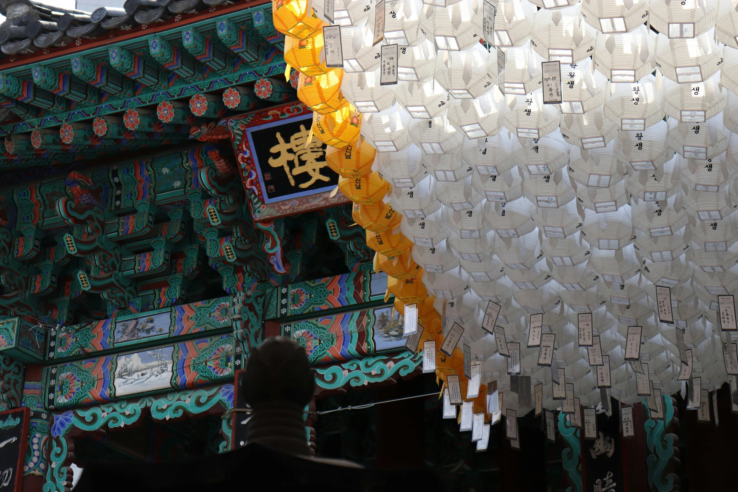 a large building with intricate hanging decorations above it