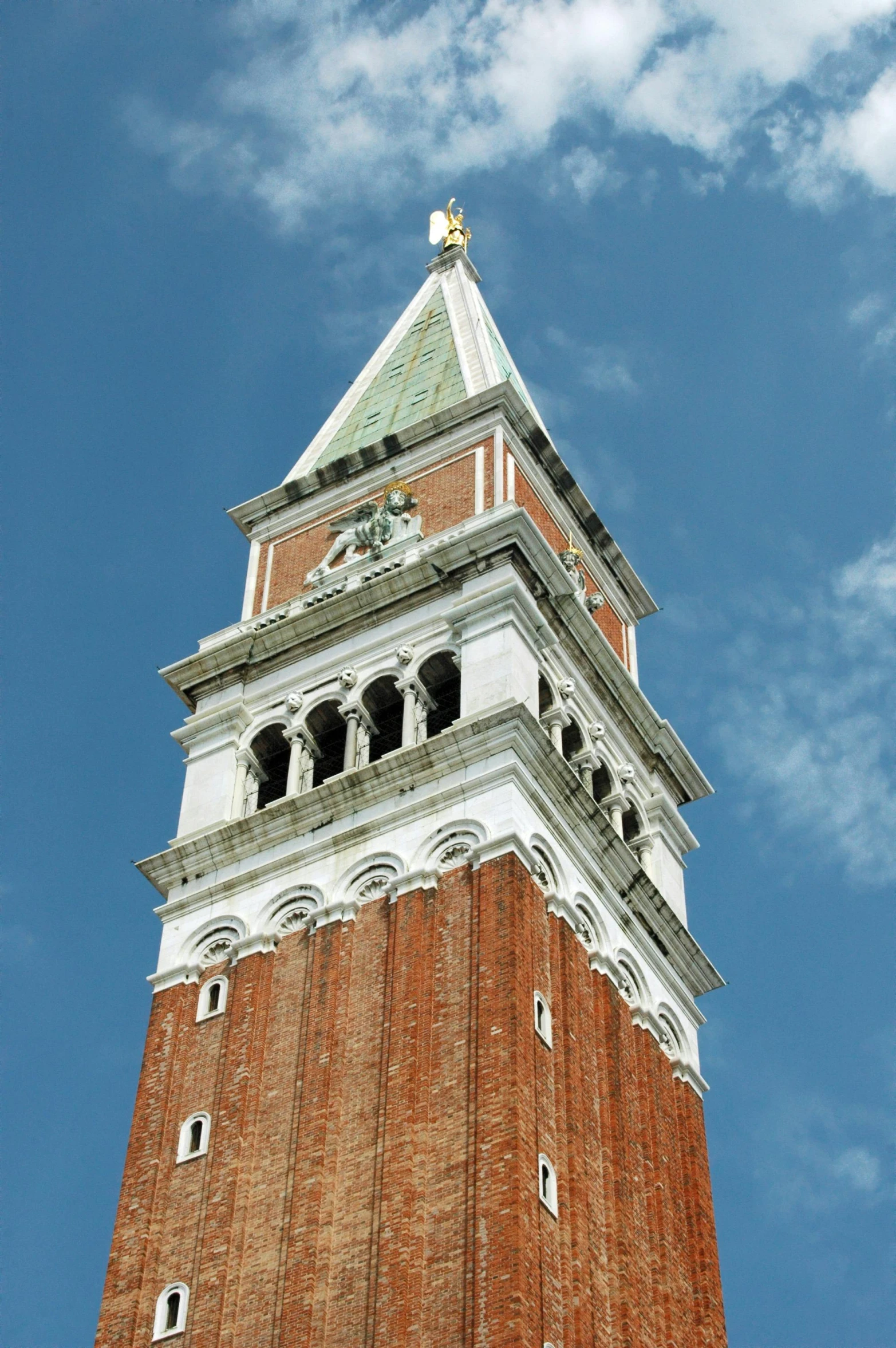 a large tower like structure with a clock built into the top