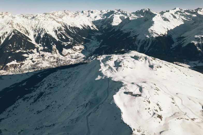 the view from the mountain shows snow covered mountains