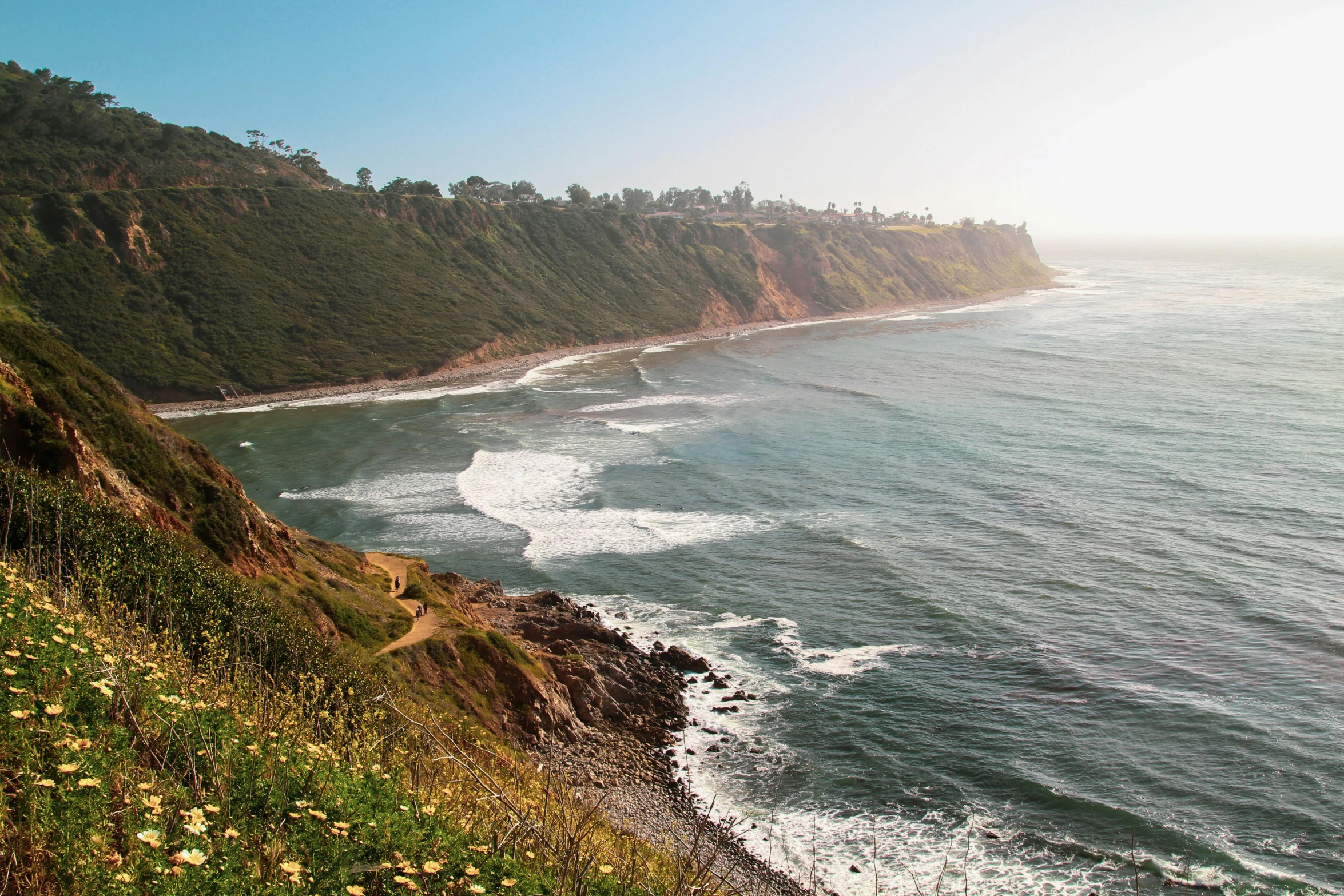 the cliff overlooks the beautiful landscape that overlooks the ocean