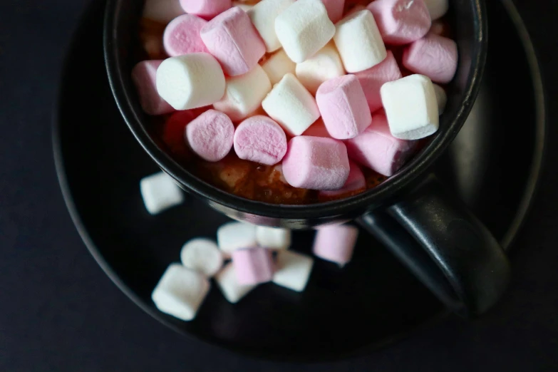 some marshmallows and bacon in a bowl