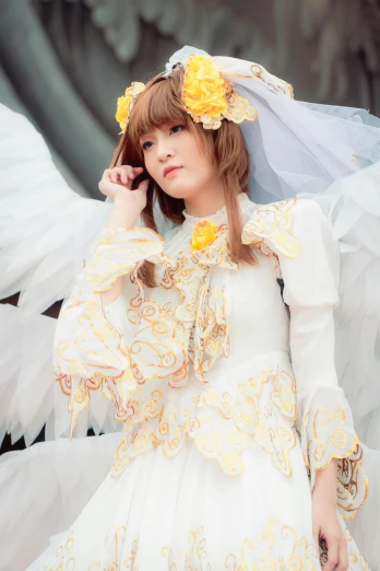 a very pretty young lady with an angel costume