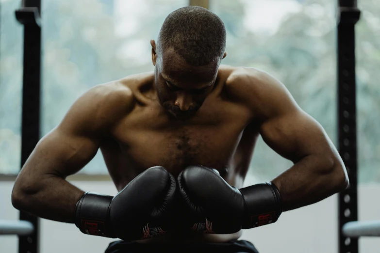 the man has both gloves on, facing away