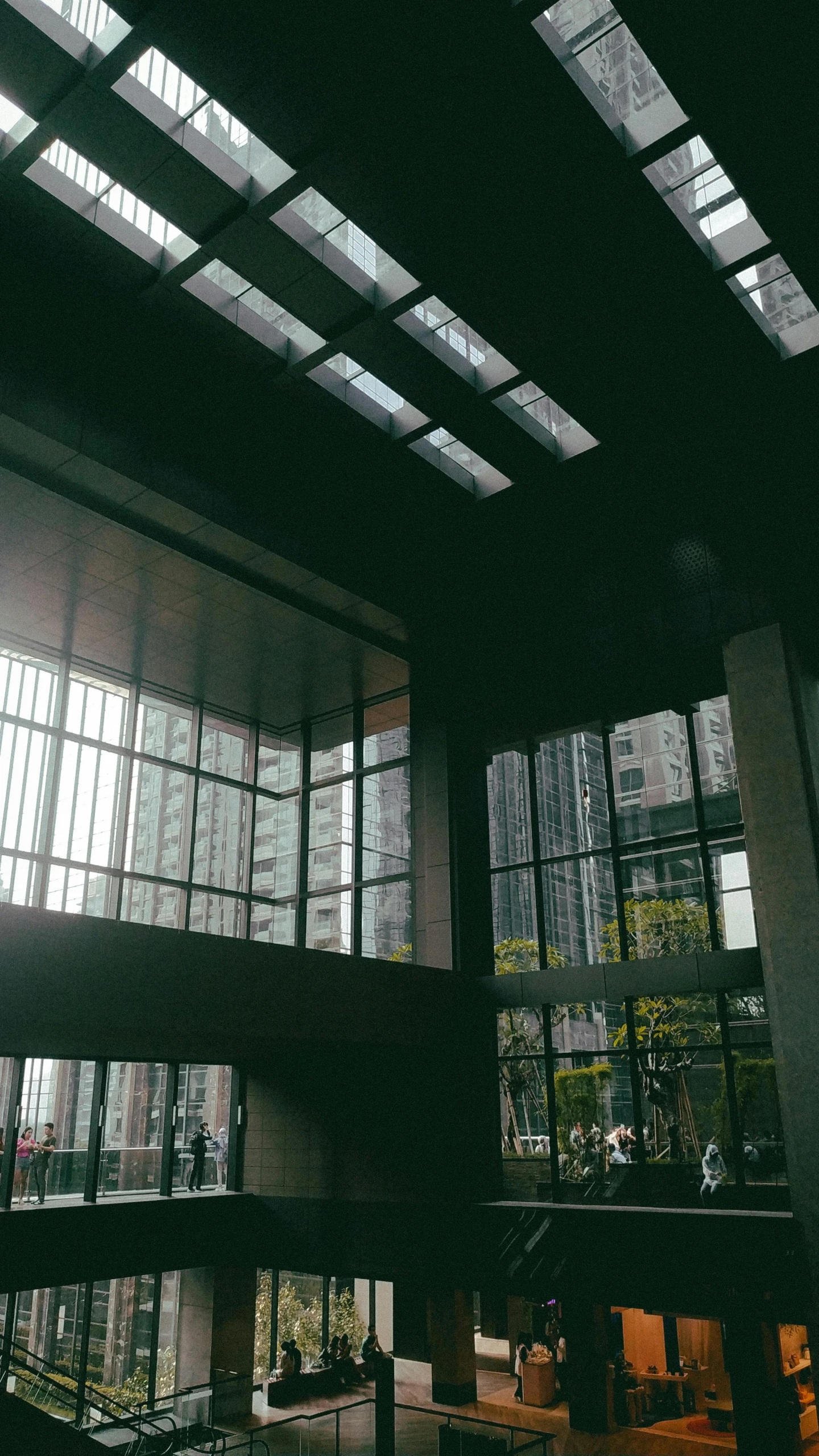 a building with a very long ceiling that has multiple windows