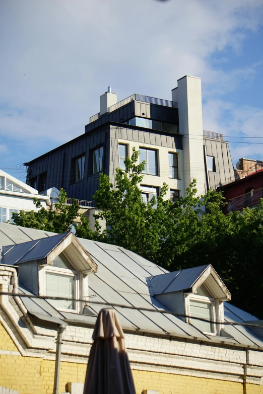 a house with two dormrals on the roof