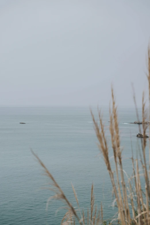 a man is skiing across the calm water