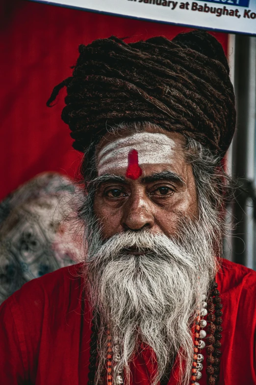 an old man with grey hair and beard with a white mustache