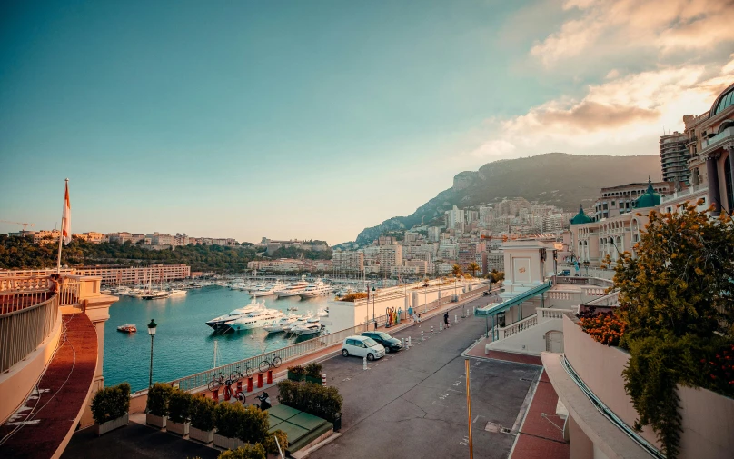 an aerial view of a marina and buildings at dusk