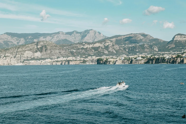 a person on a jet ski in the middle of a body of water