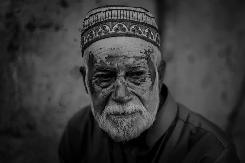 an old man with a turban on