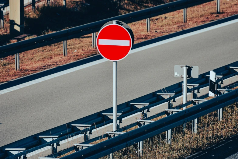 an overhead view of a street sign at an intersection