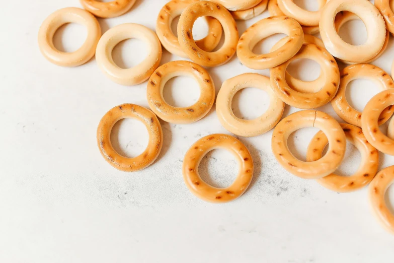 several rings on the floor of a white surface