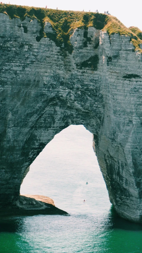 a small boat in a large body of water