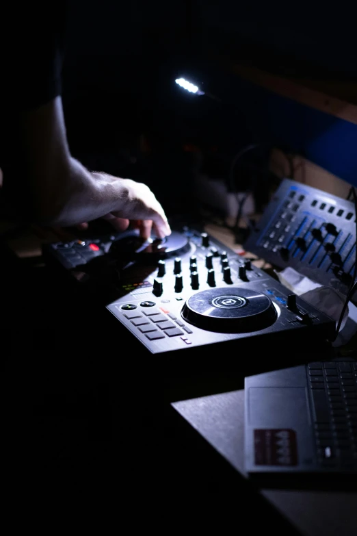 sound board and audio equipment lit up at night