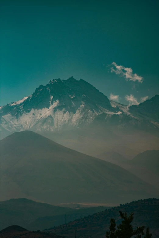 the mountain range is full of snow covered mountains