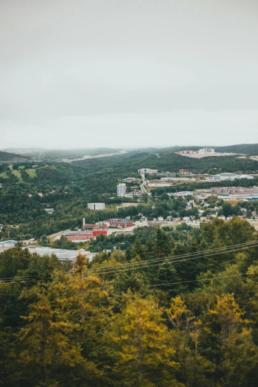 an overlook over looking a city and trees