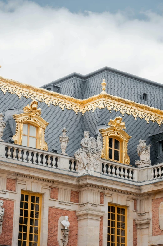 the roof of the building has many gold decorations
