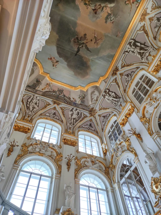 this is an elaborate ceiling in the entrance hall