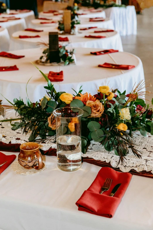 a dining table is set up with place settings