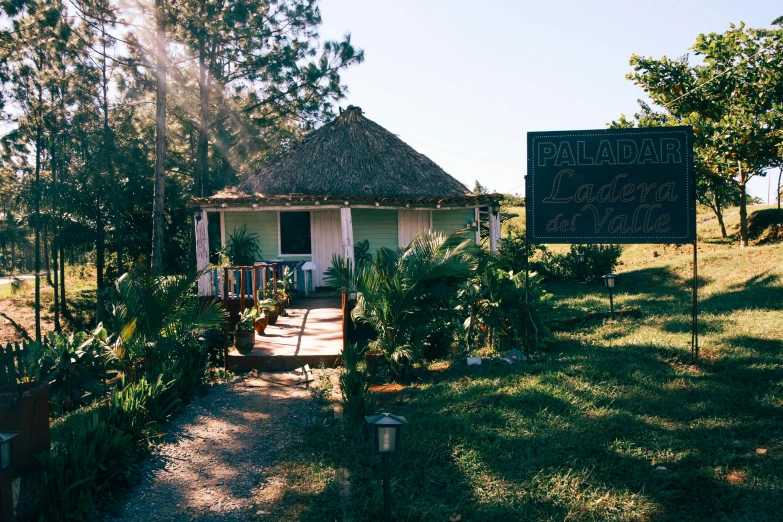 an area with a building and a sign